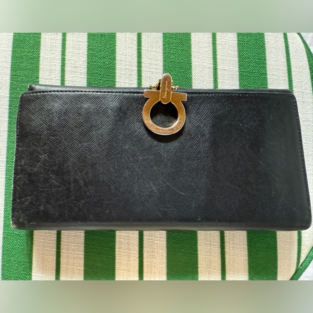 Authentic Salvatore Ferragamo black Wallet w gold hardware Used Some scratches
